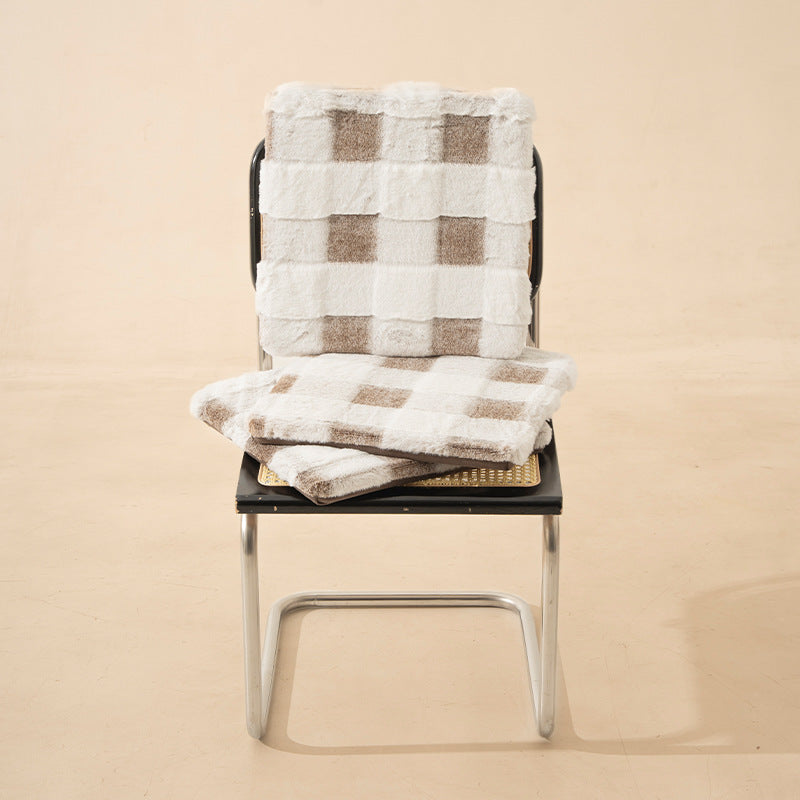 Cozy seat cushion made of faux fur with checked pattern and fastening straps