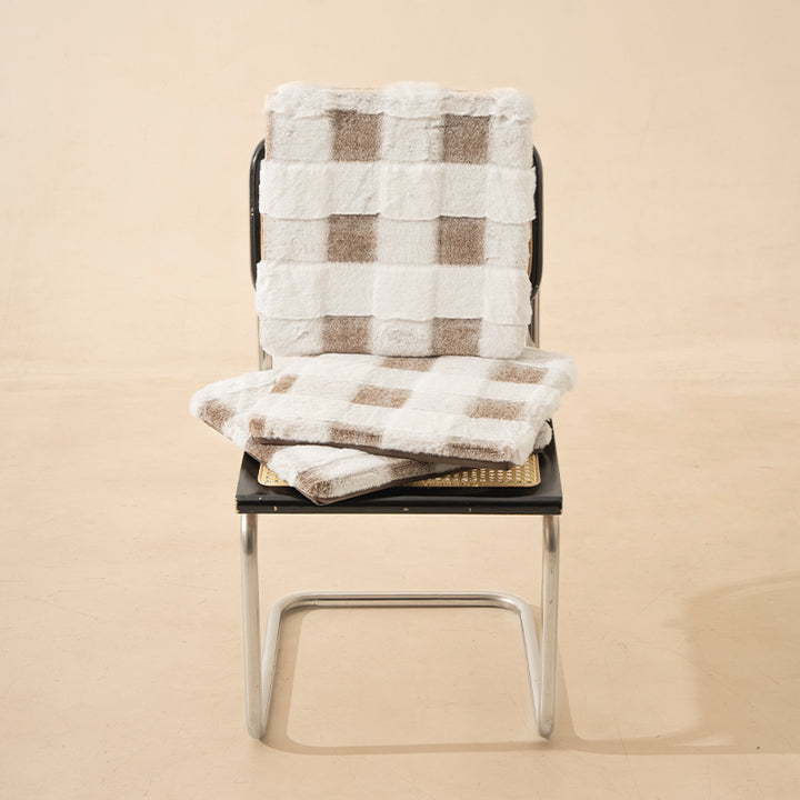 Cozy seat cushion made of faux fur with checked pattern and fastening straps
