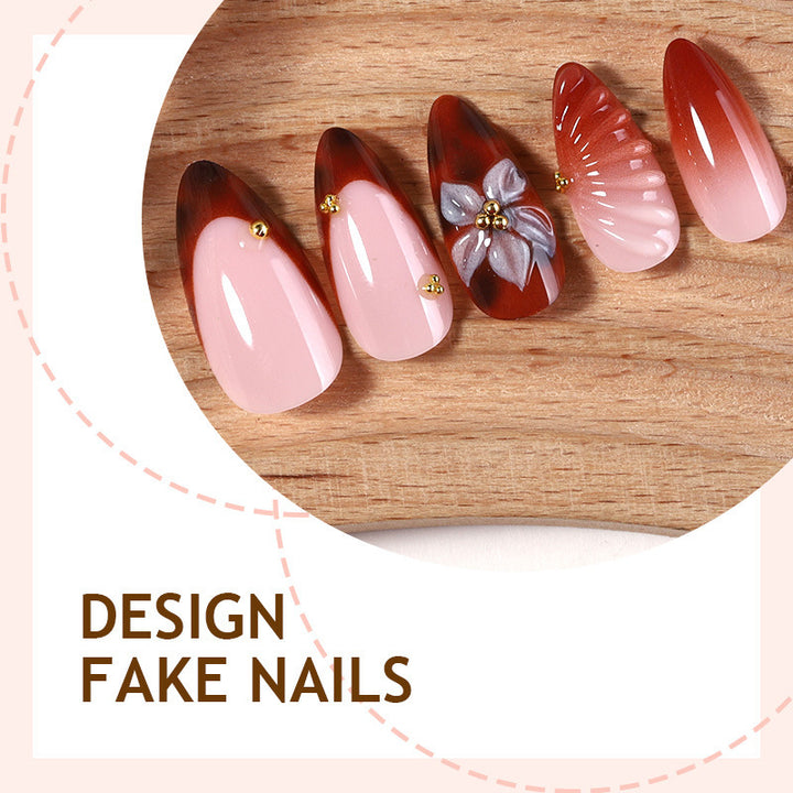 Nail art set with detailed ombre design and creative flower accents Kalsten