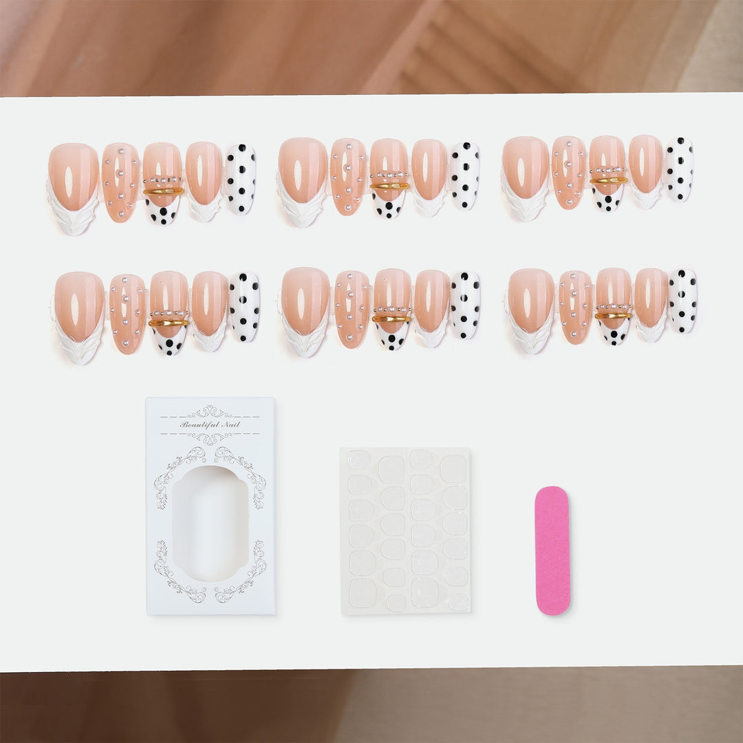 Artificial artificial nails with fashionable dots and embellishments Kalsten