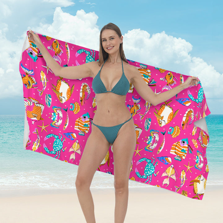 Beach towel with vibrant tropical plant motif Kalsten