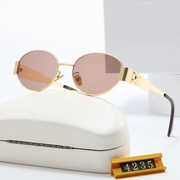Women elegant oval sunglasses with gold-colored frame Kalsten