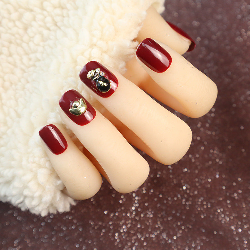 Decorative Press-On Nail Set with Unique Gold Accents