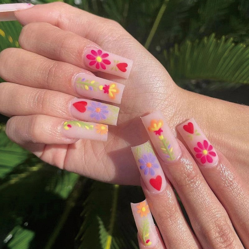 Artful Gel Nails with Elegant Floral Design and Glitter Accents Kalsten