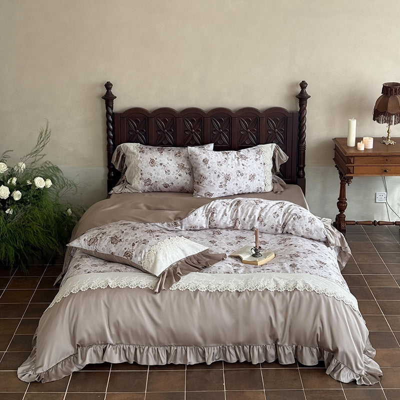 Elegant bedding set in vintage romantic style with lace applique, ruffle, and satin edging