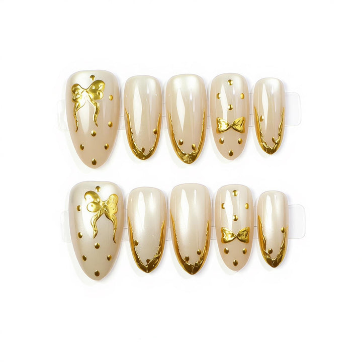 Elegant Press-On Nail Art with Golden Bow Accents Kalsten