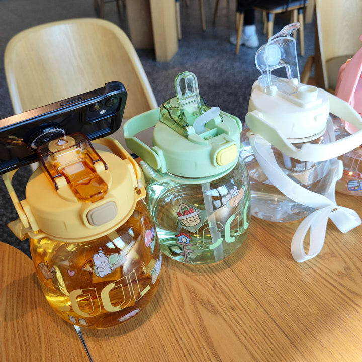 Women colorful and leak-proof water bottle with ergonomic carrying handle Kalsten