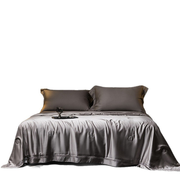 Luxurious satin bed set with silk-like surface and fine decorative stitching