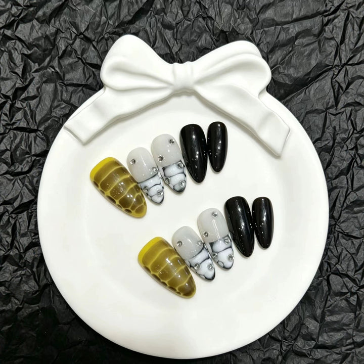 Artistic Press-On Nail Set with Decorative Gem Accents