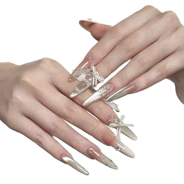Elegant Stiletto Nail Art Extensions with Decorative Accents