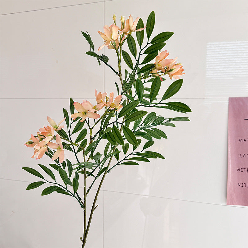 Decorative artificial flower branch with delicate flowers