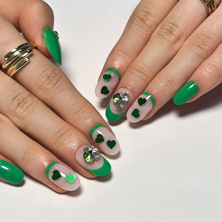 Artistic Nail Extensions with Lovable Heart Patterns and Glitter Accents Kalsten