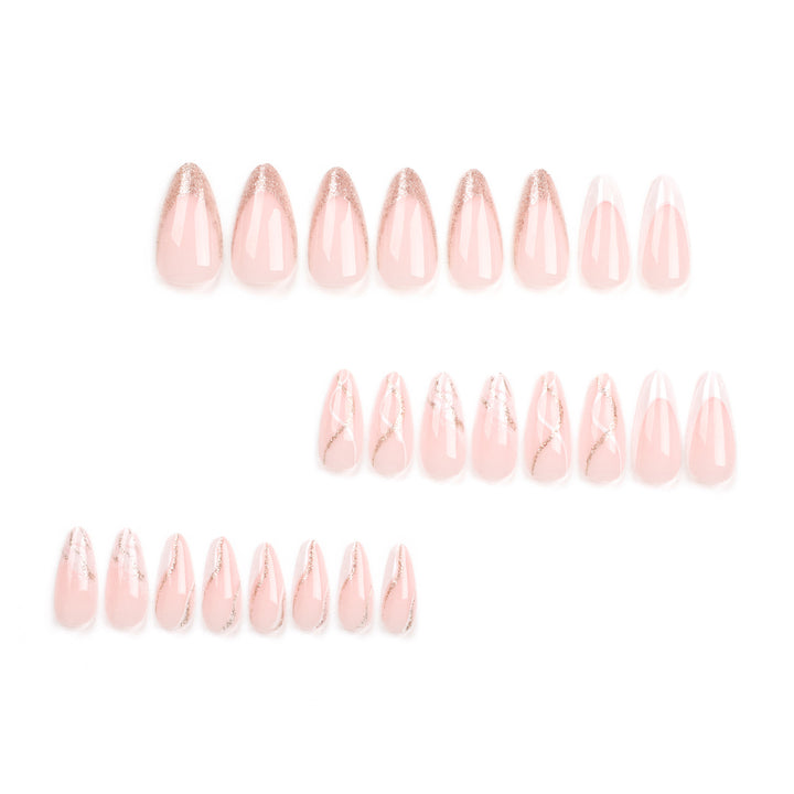 Artful stiletto nails with elegant marble and glitter design Kalsten