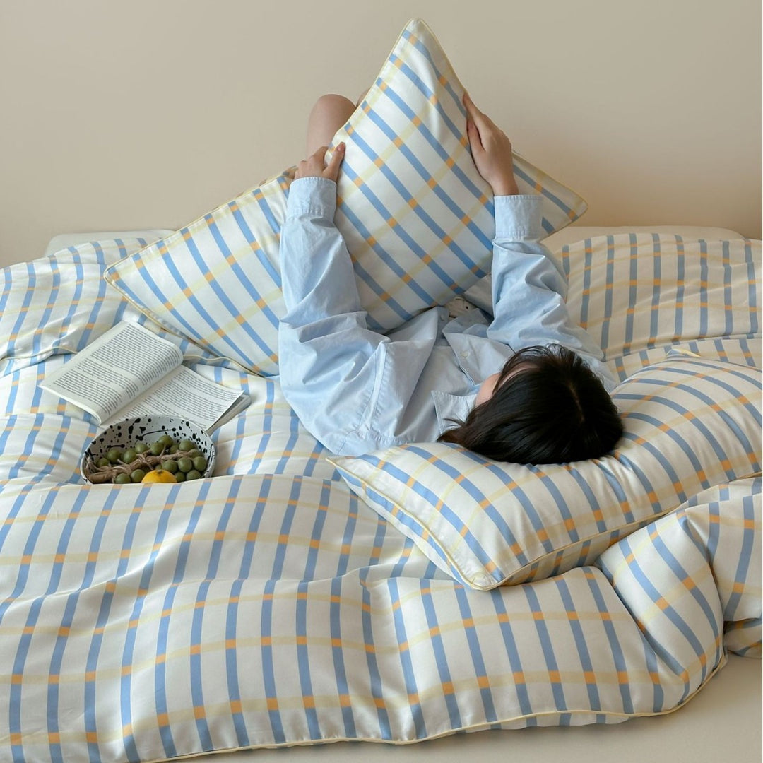 Soft cotton satin bedding with fine check and stripe pattern