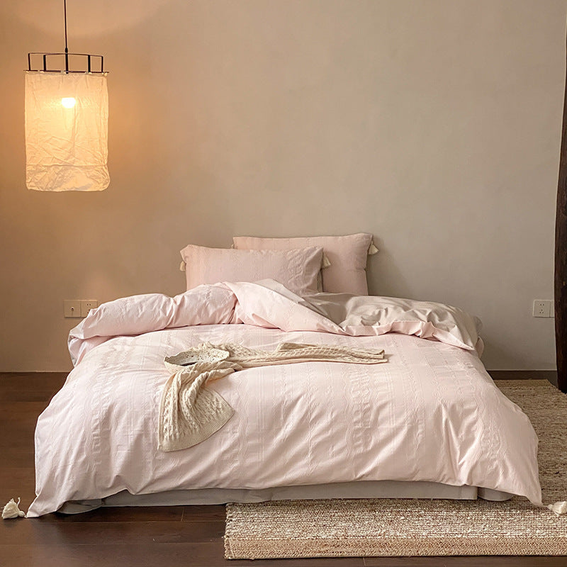 Finely textured cotton satin bedding set with tone-on-tone relief