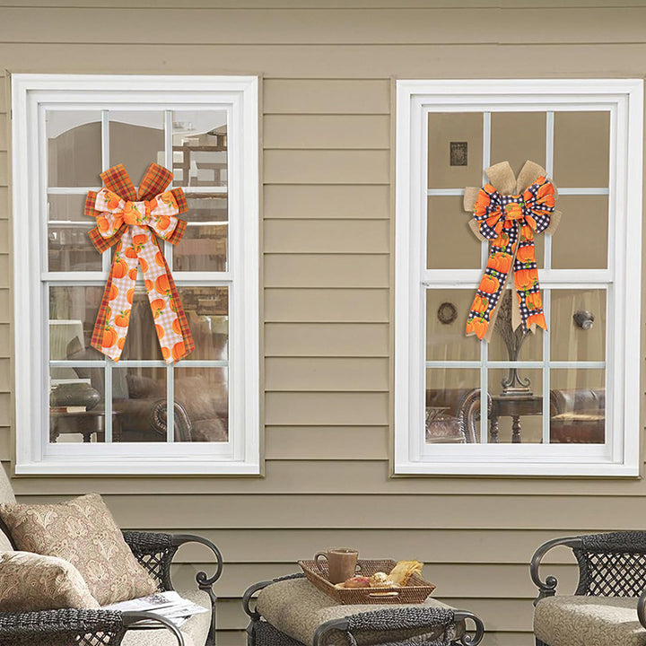 Large autumn door bow made of jute with pumpkin print and gingham ribbons