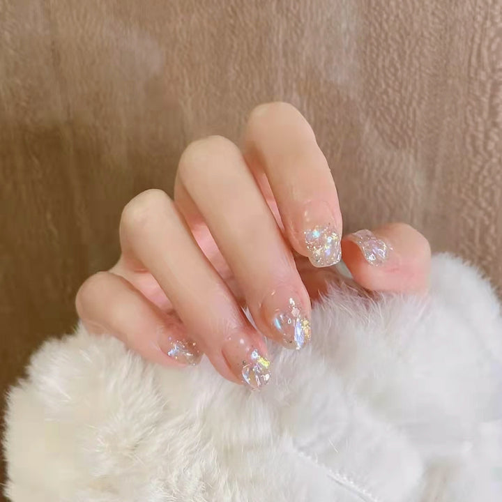 Glittering artificial nails with holographic accents Kalsten