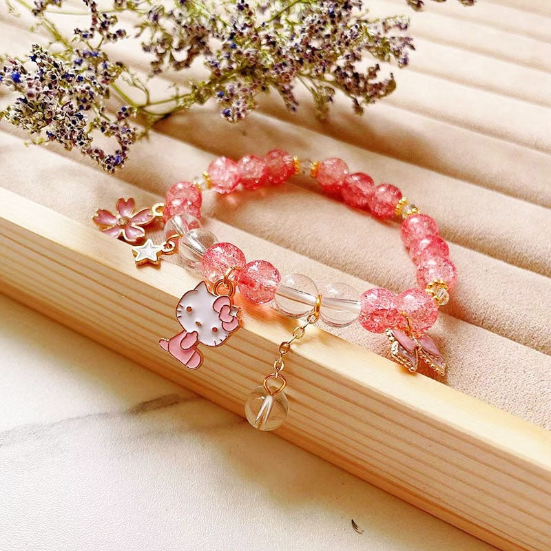 Elegant bracelet with animal and glitter pendants Kalsten