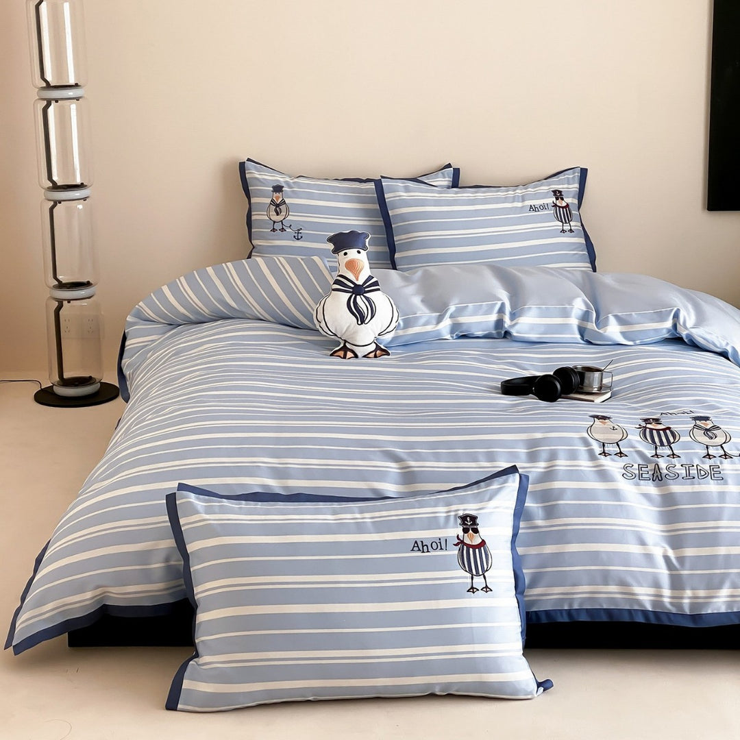 Maritime cotton satin bedding set with embroidered seagull motifs and fine stripe pattern
