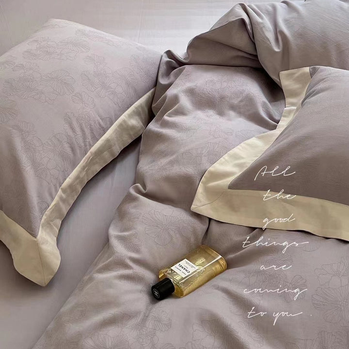 High-quality bedding set made of cotton satin with jacquard floral relief and contrasting hem finishing