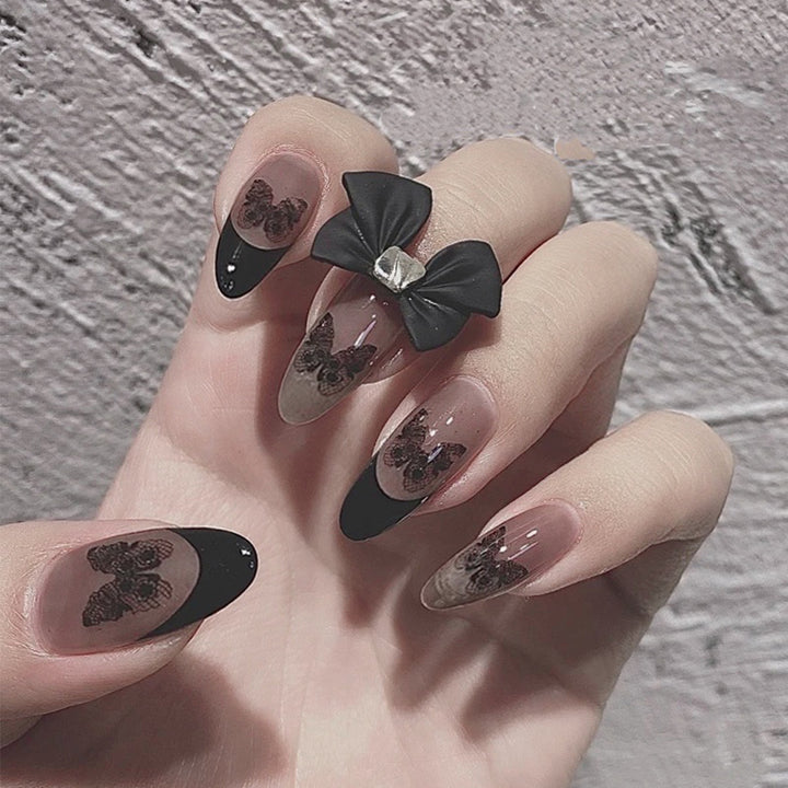 Artful nail art in Gothic style with butterfly motifs Kalsten