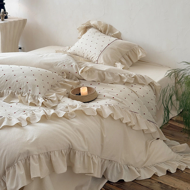 Duvet cover set with ruffle, embroidered dots, and stonewashed cotton finish