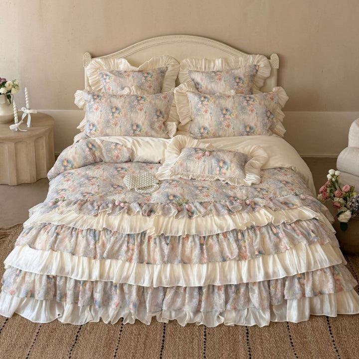 Romantic bedding set with layered ruffle, frills, and delicate watercolor flower print