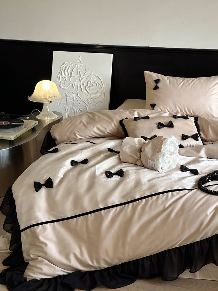 Elegant bedding set made of cotton satin with attached bows and ruffles