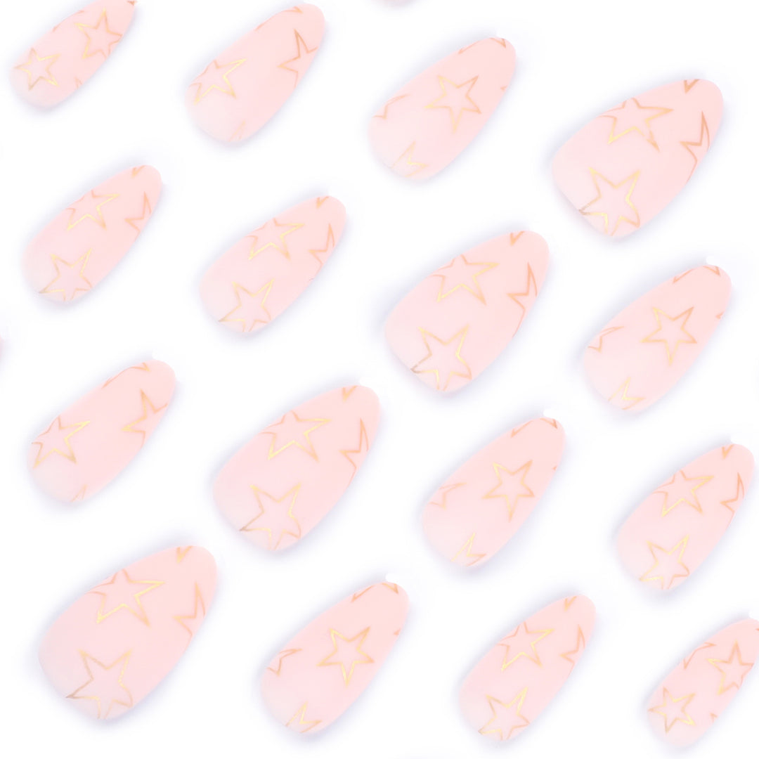 Artful Nail Art with Golden Star Motifs Kalsten