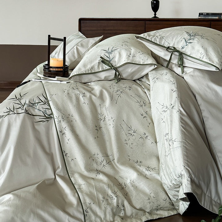 Reversible cotton satin bedding set with fine bamboo print and pillowcases with tie bands