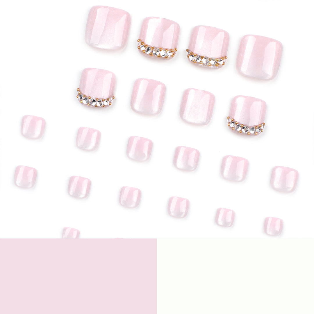 Artful toenail art with glitter and rhinestone decorations Kalsten