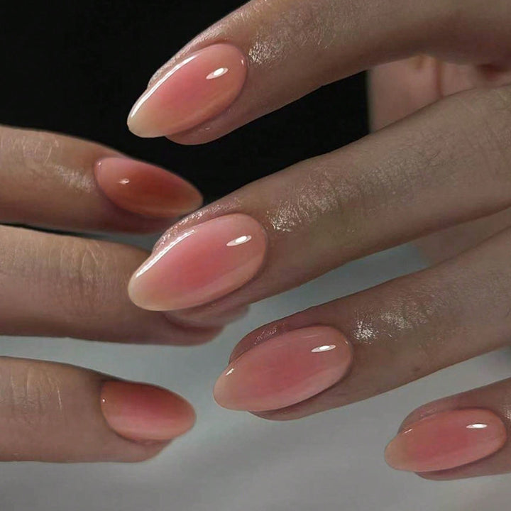 Acrylic nail set with elegant nude ombre effects Kalsten