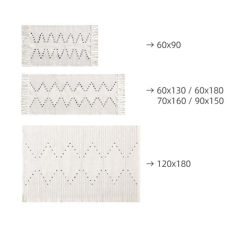 Handwoven cotton rug with dot tuft zigzag and fringed edge