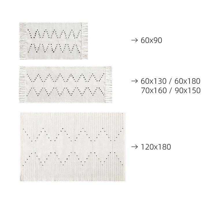Handwoven cotton rug with dot tuft zigzag and fringed edge