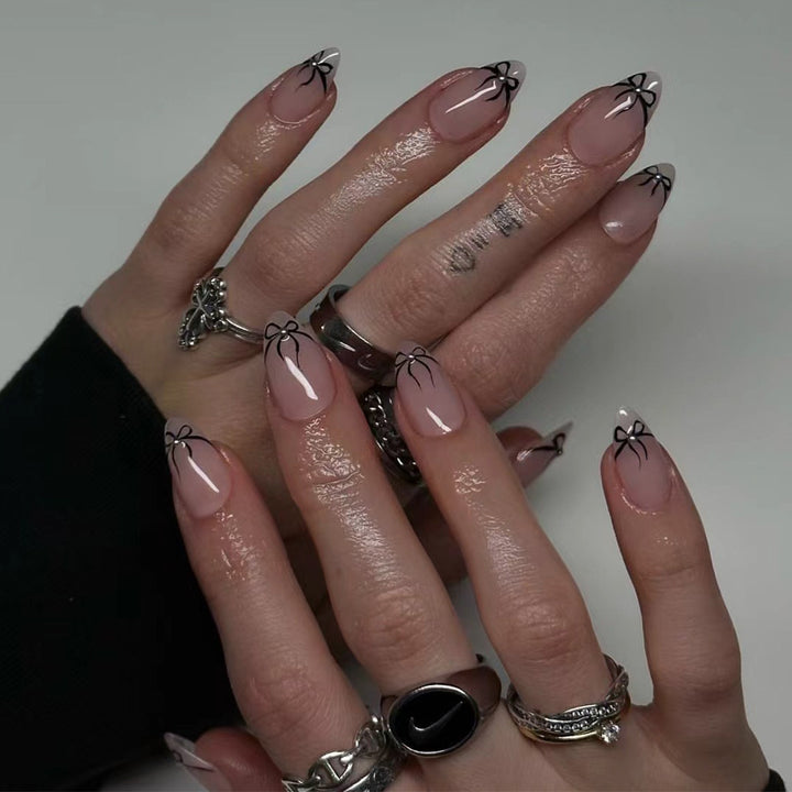 Artful nail art with elegant bow designs Kalsten
