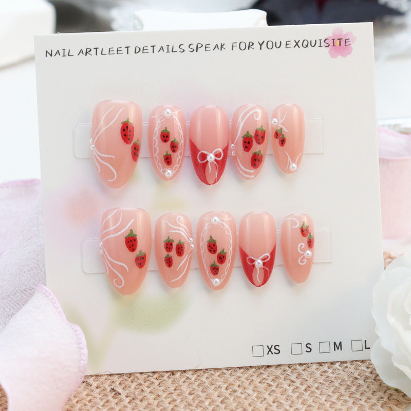 Artificial nail set with romantic strawberry and bow motifs Kalsten