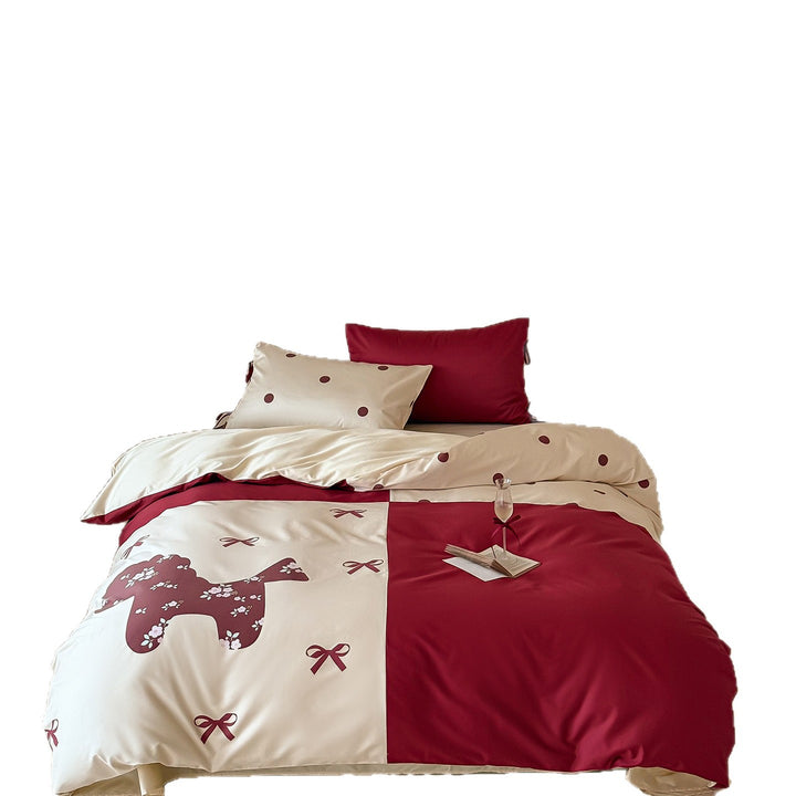 Reversible bedding set with decorative dog and dot pattern as well as pillowcases with ties
