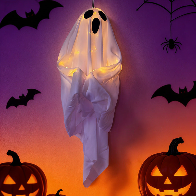Hanging ghost decoration made of fabric with integrated LED string lights