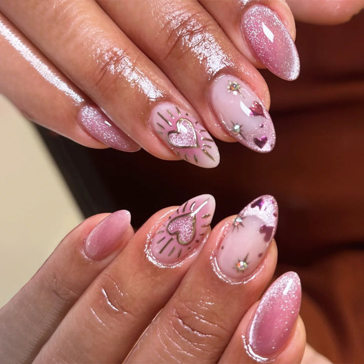 Artful Nail Art with Heart Design and Glitter Kalsten