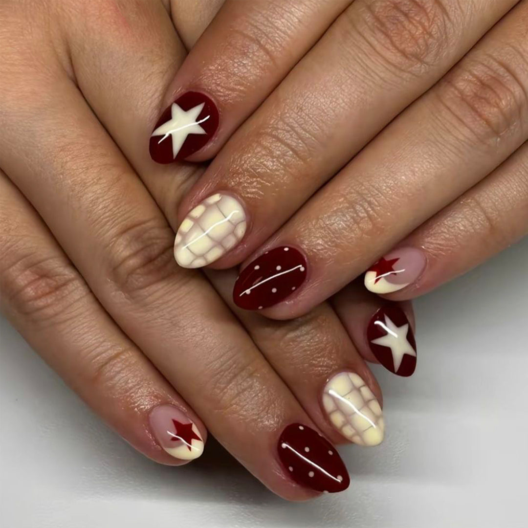 Artful nail art with geometric pattern and festive design Kalsten