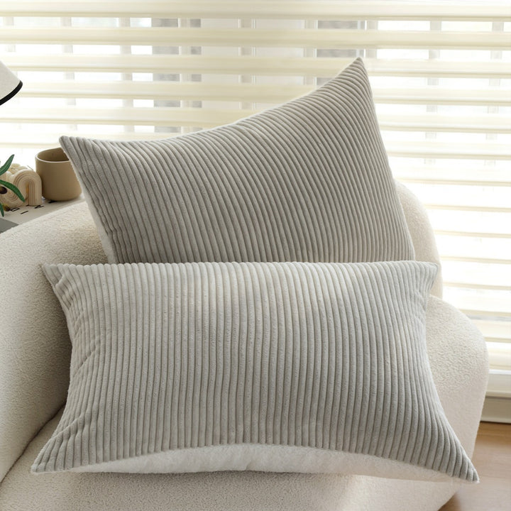 Rectangular corduroy cushion cover with a fine ribbed structure and teddy inner side Kalsten