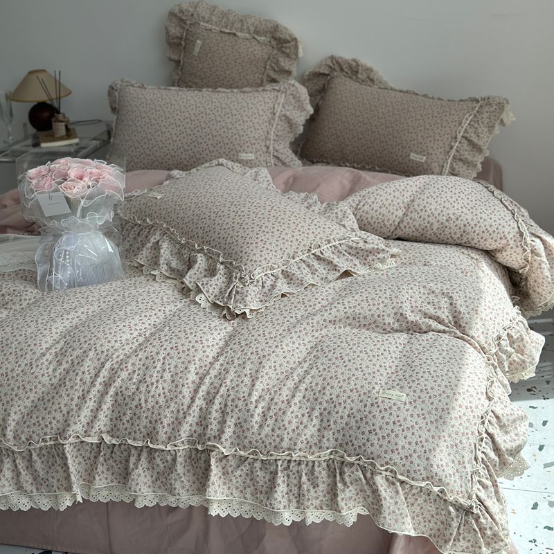 Duvet and pillowcase set made of cotton cambric with ruffles and eyelet embroidery