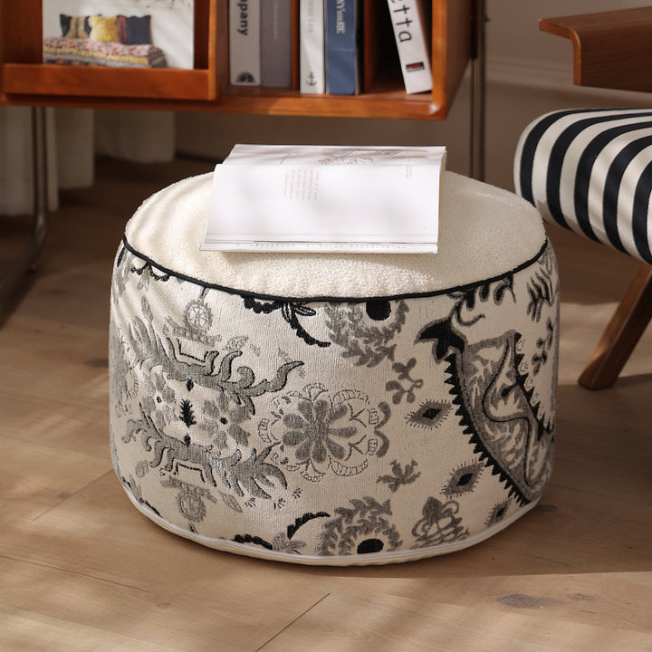 Flower-shaped floor pouf with cuddly teddy fleece surface and removable cover