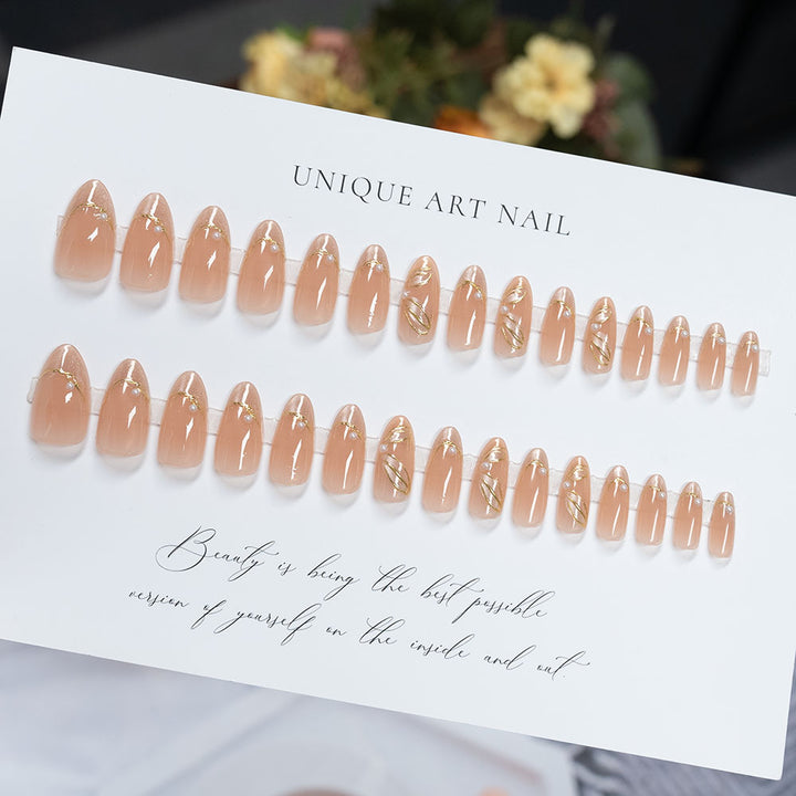 Elegant French Tip Press-On Nails with Gold Accents