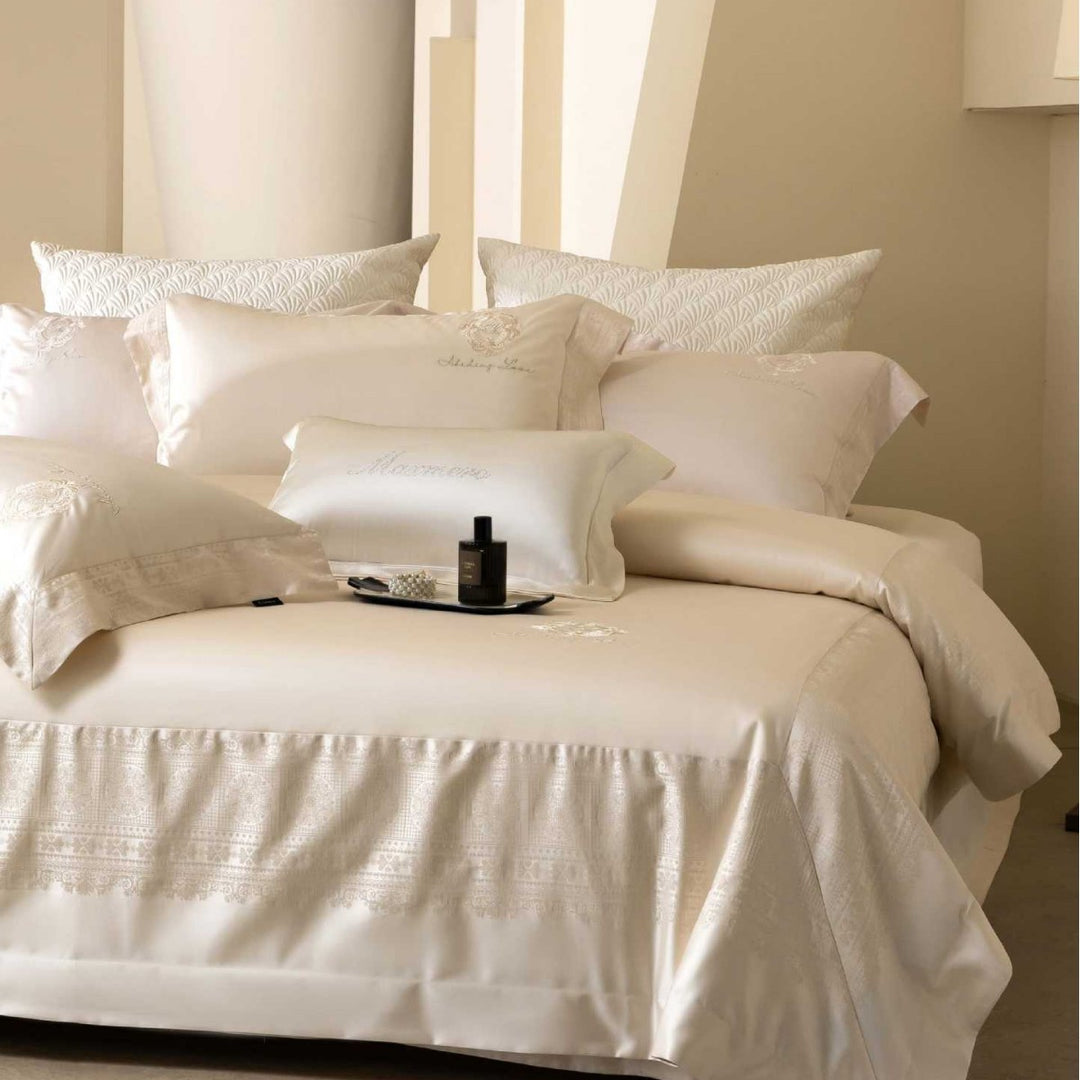 Premium bedding set made of cotton satin with jacquard border and quilted bedspread