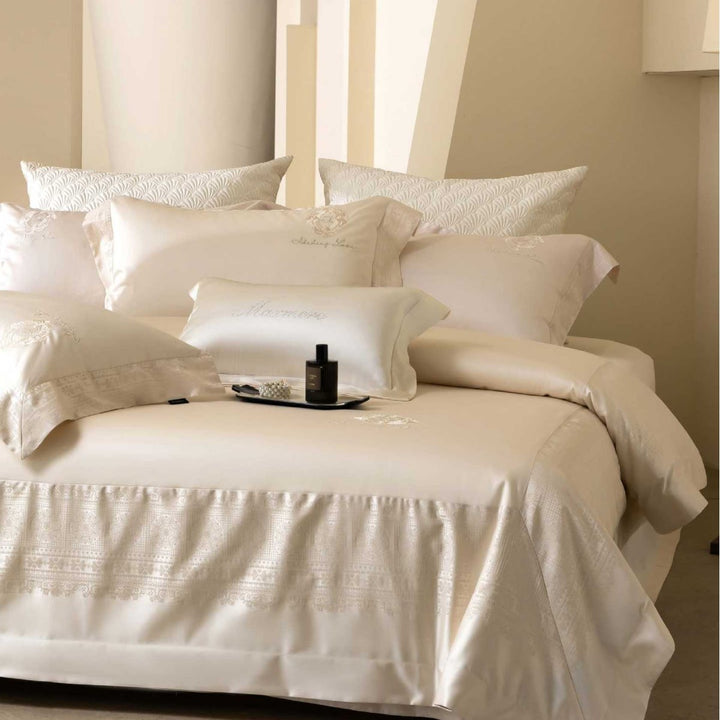 Premium bedding set made of cotton satin with jacquard border and quilted bedspread