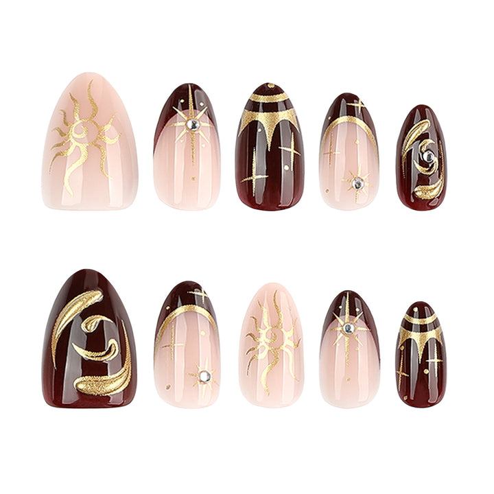 Artful nail art with golden accents and mystical motifs Kalsten