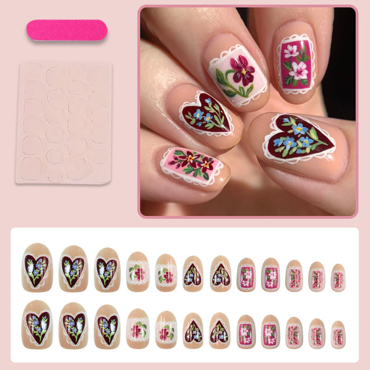 Artificial nail set with floral designs and romantic details Kalsten