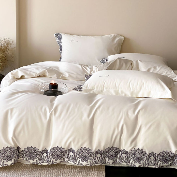 Cotton satin duvet cover set with fine floral border embroidery and silky feel