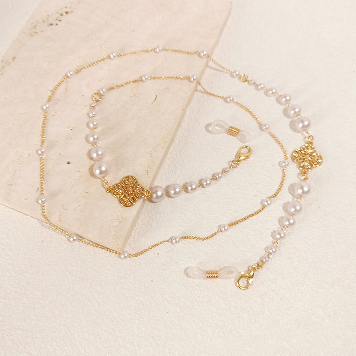 Sparkling glasses holder chain with pearls and floral pendants Kalsten
